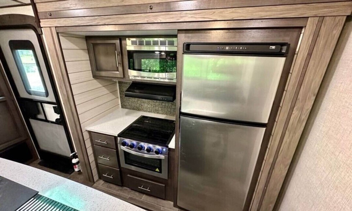 Lucas RV Rental | Black Fork River front fully functioning Camper