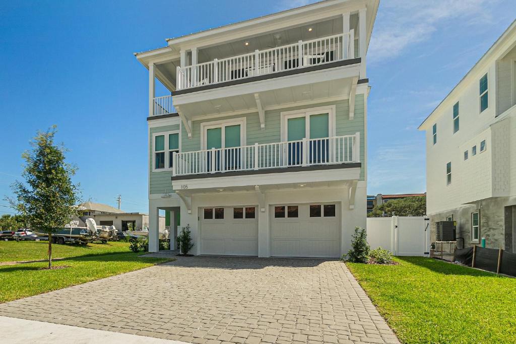 St. Augustine Beach House | Endless Summer Oasis- Luxury 5br, heated pool, elevator, steps to ocean!