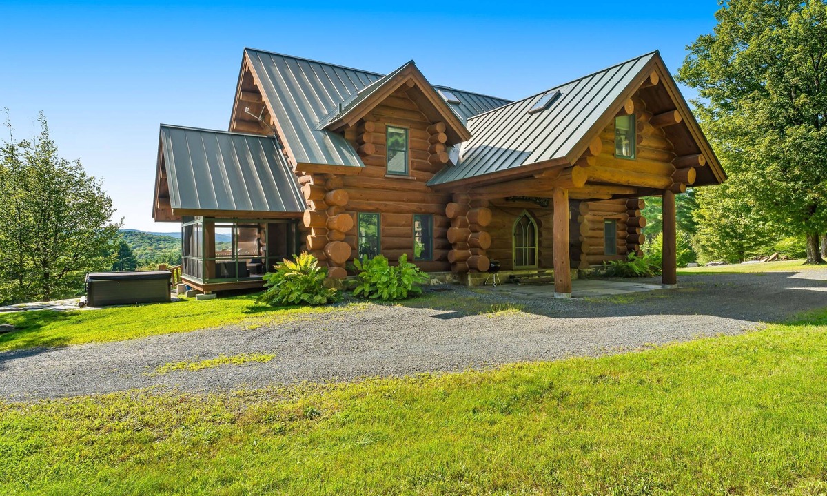 Hartland Four Corners House | Log manor on 65 private acres of land with entertaining amenities & hot tub