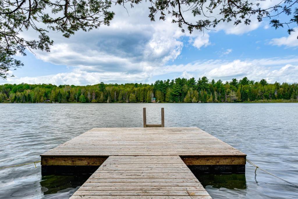 Craftsbury Common House | Tree-Lined Group Retreat on Little Hosmer Pond