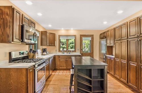 Nekoosa House | 8th Haven - Pool! Golf! 7 Beds! Gas Grill &7 Fire Pit