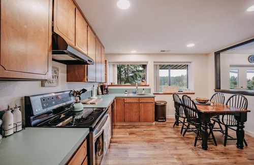 Camano Island Apartment | Baker View Lodging with hot tub, sound, mountain, and territorial views.