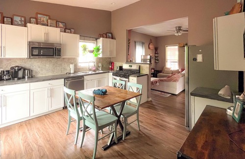 West Central House | Boho 2 Bed 2 Bath w/Deck & Fire Pit - 4 Mins to Downtown - Kid & Dog Friendly