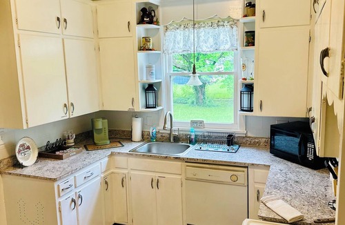 Shelbyville Apartment | Charming Victorian at Lake Shelbyville ⋅ Sleeps 6 ⋅Sunroom ⋅ Fire Pit ⋅ Parking