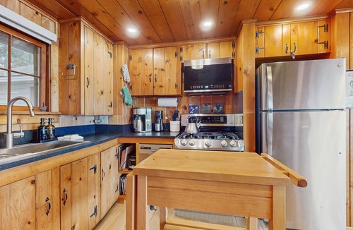 Freeland House | Charming waterfront home with fire pit and access to private beach