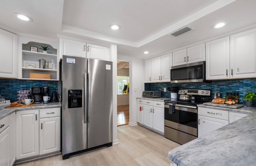 Spring Hill House | Direct Gulf Access | Heated Pool | 45’ Dock + Fire Pit