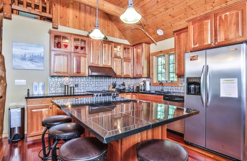 St Germain House | Lakefront log cabin on Lost Lake with dock, kayaks, large deck, and fire pit!