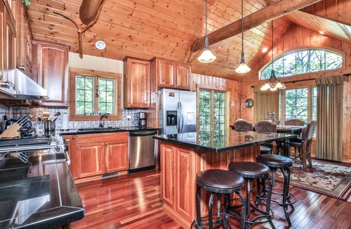 St Germain House | Lakefront log cabin on Lost Lake with dock, kayaks, large deck, and fire pit!