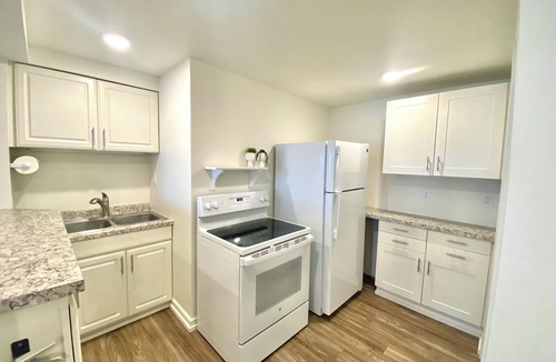 East Hillside Apartment | Location and panoramic lake views will make for an unforgettable experience.