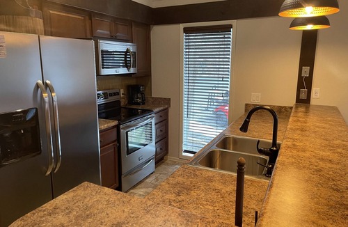 Lake of the Ozarks Ski Chalet | MARGARITAVILLE RESORT Tan-Tar-A LAKEFRONT 3BD 3bath-NEW SPA kayaks & fireplace!