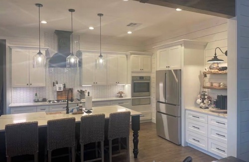 Sealy House | Modern farmhouse with a pool