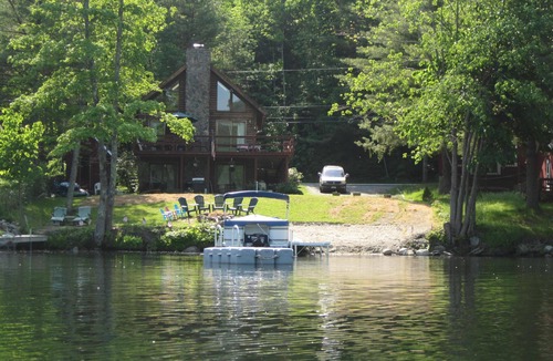 Wells Ski Chalet | Modern Log Home with 70 feet of lakefront! Great Fishing and Swimming!