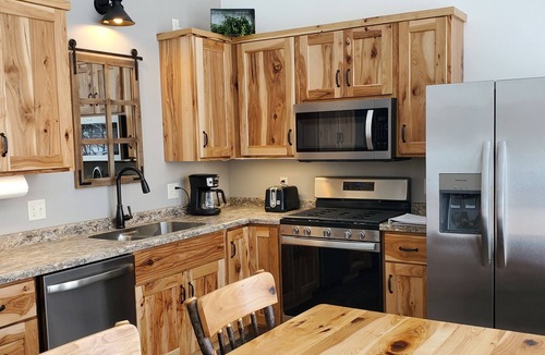 Phillips Cabin | New waterfront cabin with expansive lake-facing windows, Long Lake, Phillips