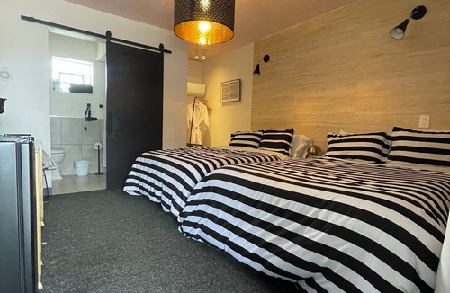 Greeley Hotel | Rainbow Motel