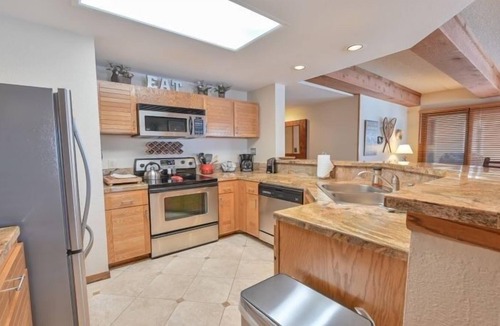 Mount Crested Butte Condo | Rustic 5th-Floor Condo with Private Balcony & Wood Fireplace by RedAwning