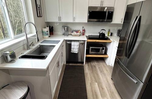 Longview House | Spacious home and lower level condo with outside entrance.