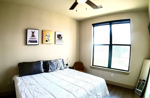Riverside Terrace Apartment | Spacious Luxury for 6: WiFi, 3 TVs, Pool & Gym