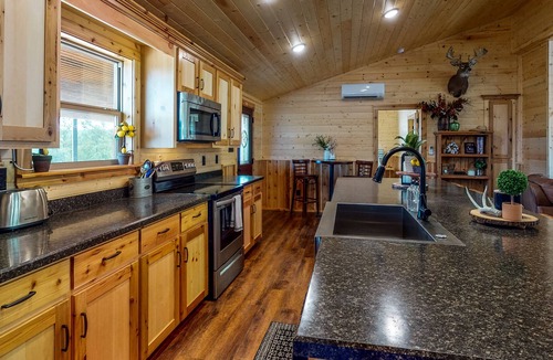 Stringtown House | Two adjacent cabins - channel access, kayaks, canoe & firepit - dog-friendly