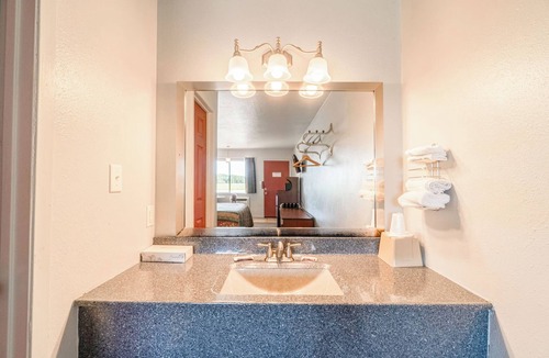 Aurora Hotel | Two Units, One Adventure: Walk to Local Shops, Enjoy Breakfast & Highway Access