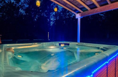 Eustis House | Uhost AI - Get Cozy & Relax! 4BR, 2BA, Hot Tub