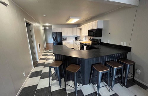 Miller Apartment | Updated apartment on Main Street! Easy access to bars, restaurants, & shopping!