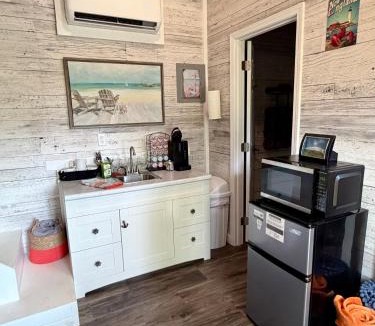 Cape Girardeau Resort | Vibrant Tiny Home Retreat on Creek & Fire Pit