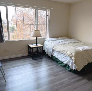 Big bedroom shared bathroom