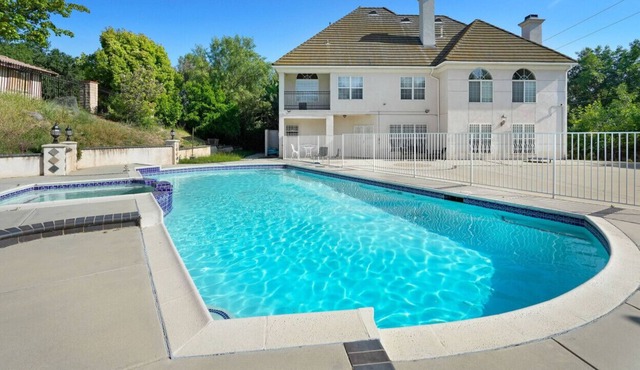 Captivating Chateau Getaway in Covina: 5BR Oasis with Pool, Fitness Studio, X-box Gaming, Chess, and Enchanting Gardens