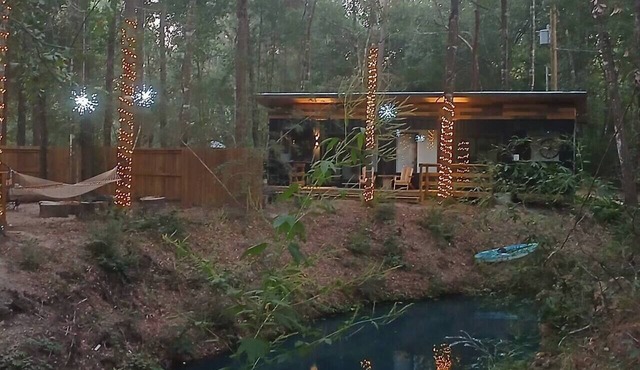 Creekside Cabin in a Magical Forest
