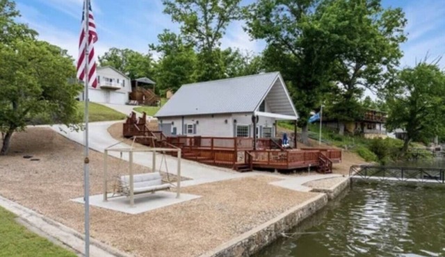 Marvelous 3-bedroom home steps to the water of a nice quiet calm cove.