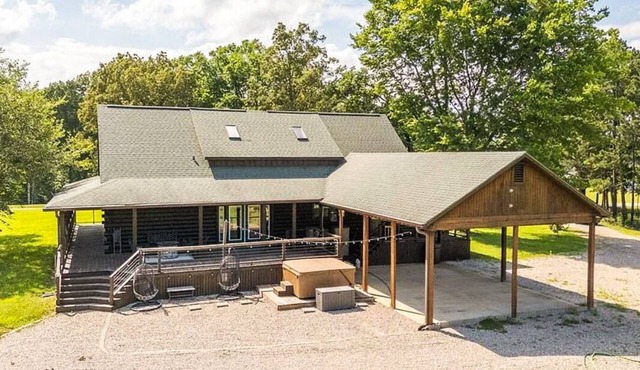 Private 5 BR cabin on 56 acres. Hot tub, Hunt, fish, and near the lake and town