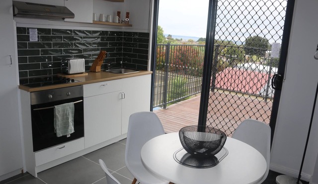 private Modern studio apartment with ocean views, balcony and Boat parking