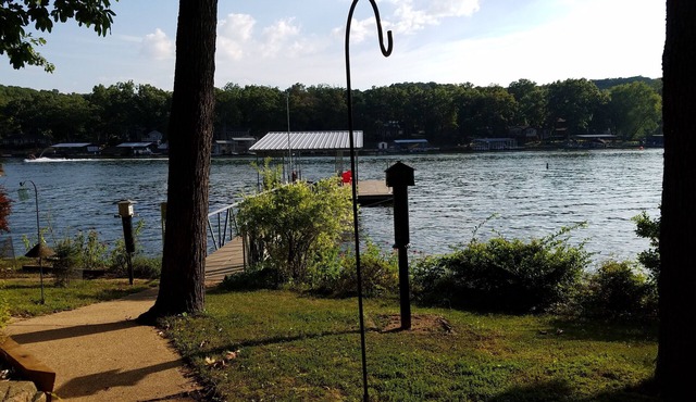 Quiet location, beautiful lakefront home in a cove. Private covered boat dock!