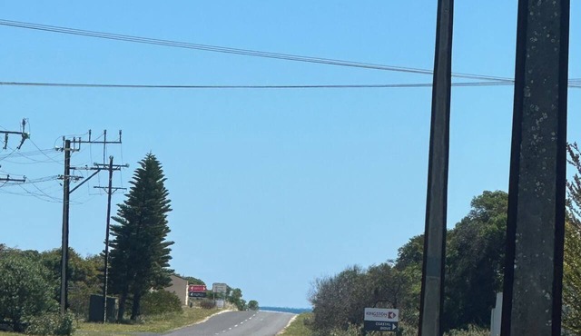 Stay on pinks beach road, 500m walk to pinks beach