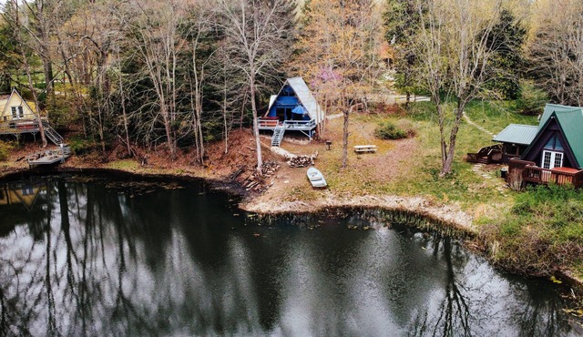 Three A-frame Cabins, a provate Pond, row boats!